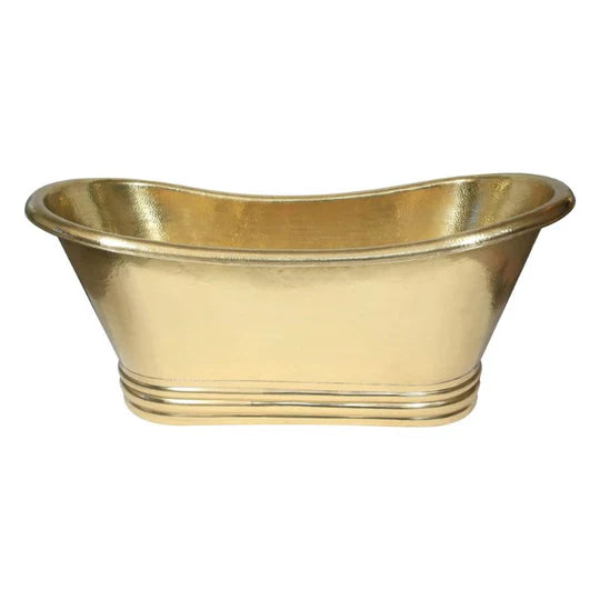 Freestanding unlacquered solid brass bathtub in slipper design placed in a marble bathroom interior