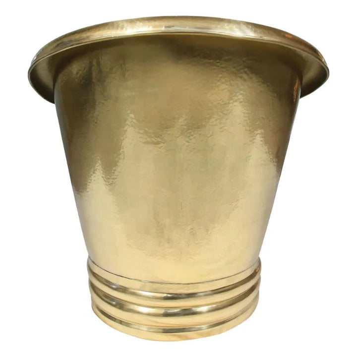 Luxury unlacquered brass soaking tub with antique-style freestanding faucet